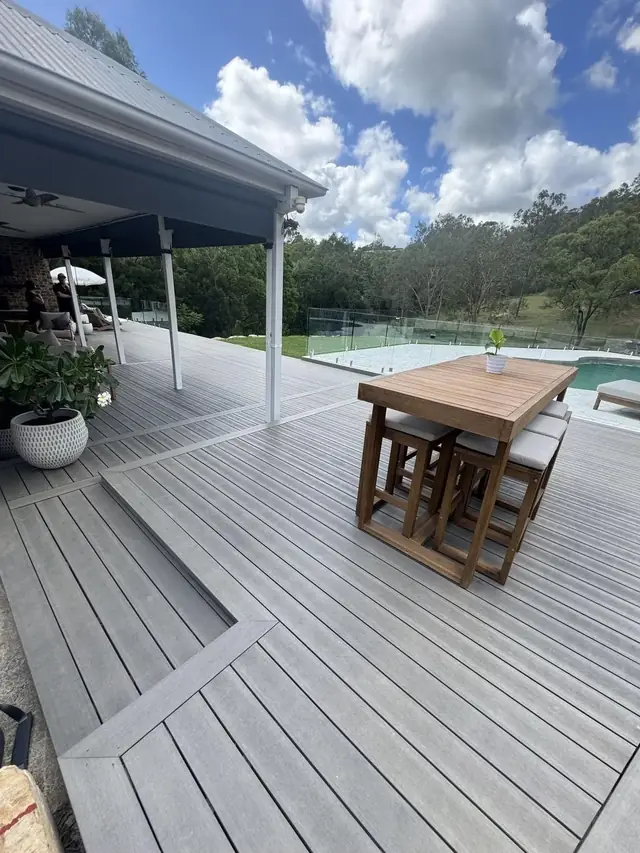 Covered deck with outdoor dining setting