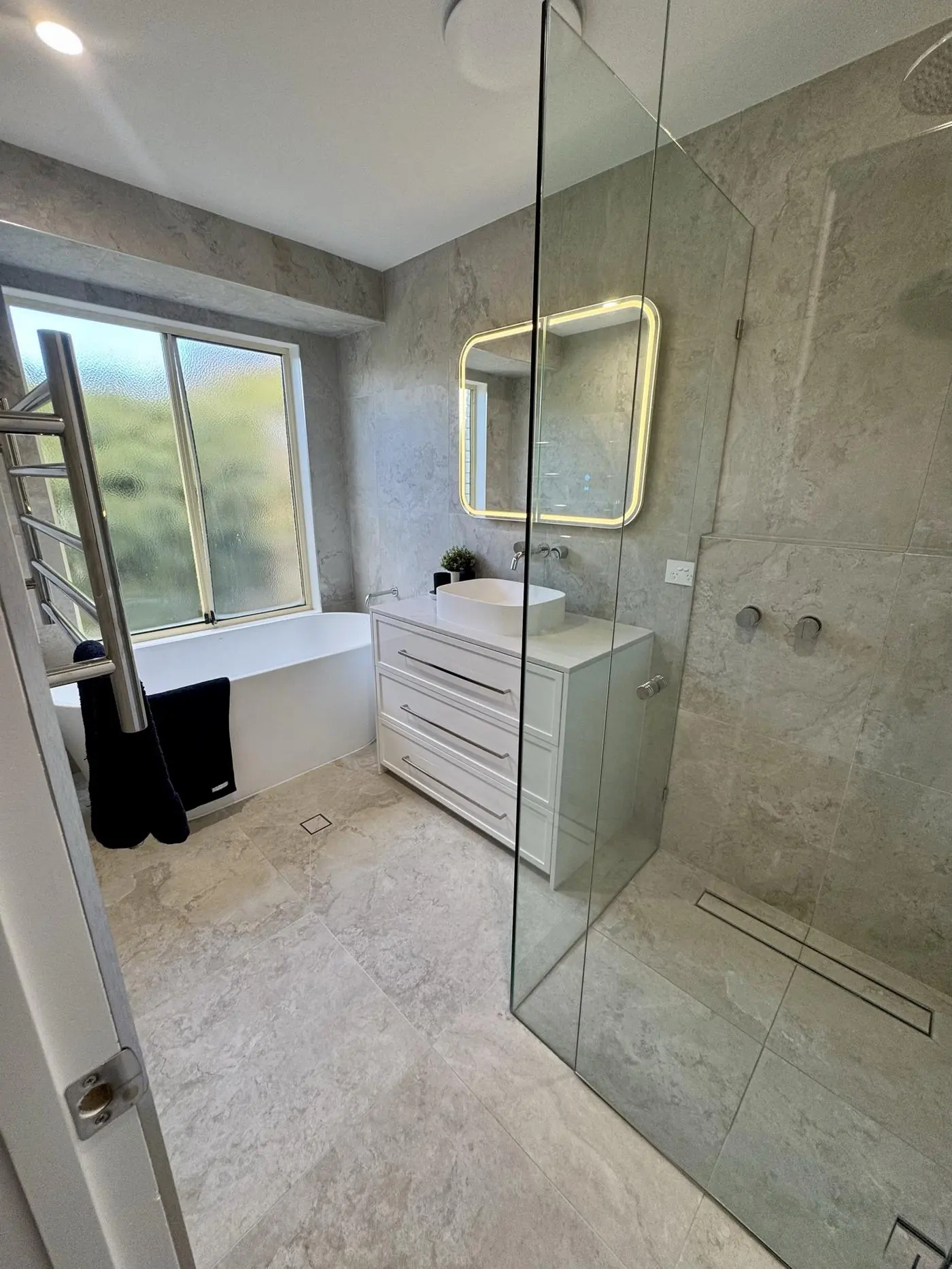 Wellington Point main bathroom with freestanding bath